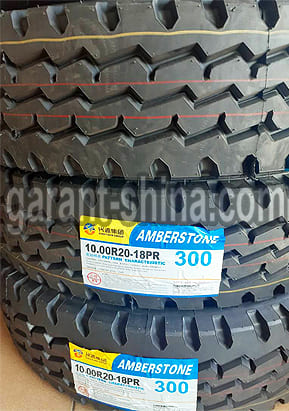 Amberstone 300 (универсальная) 10.00 R20 149/146L 18PR - Фото шин с этикетками на складе